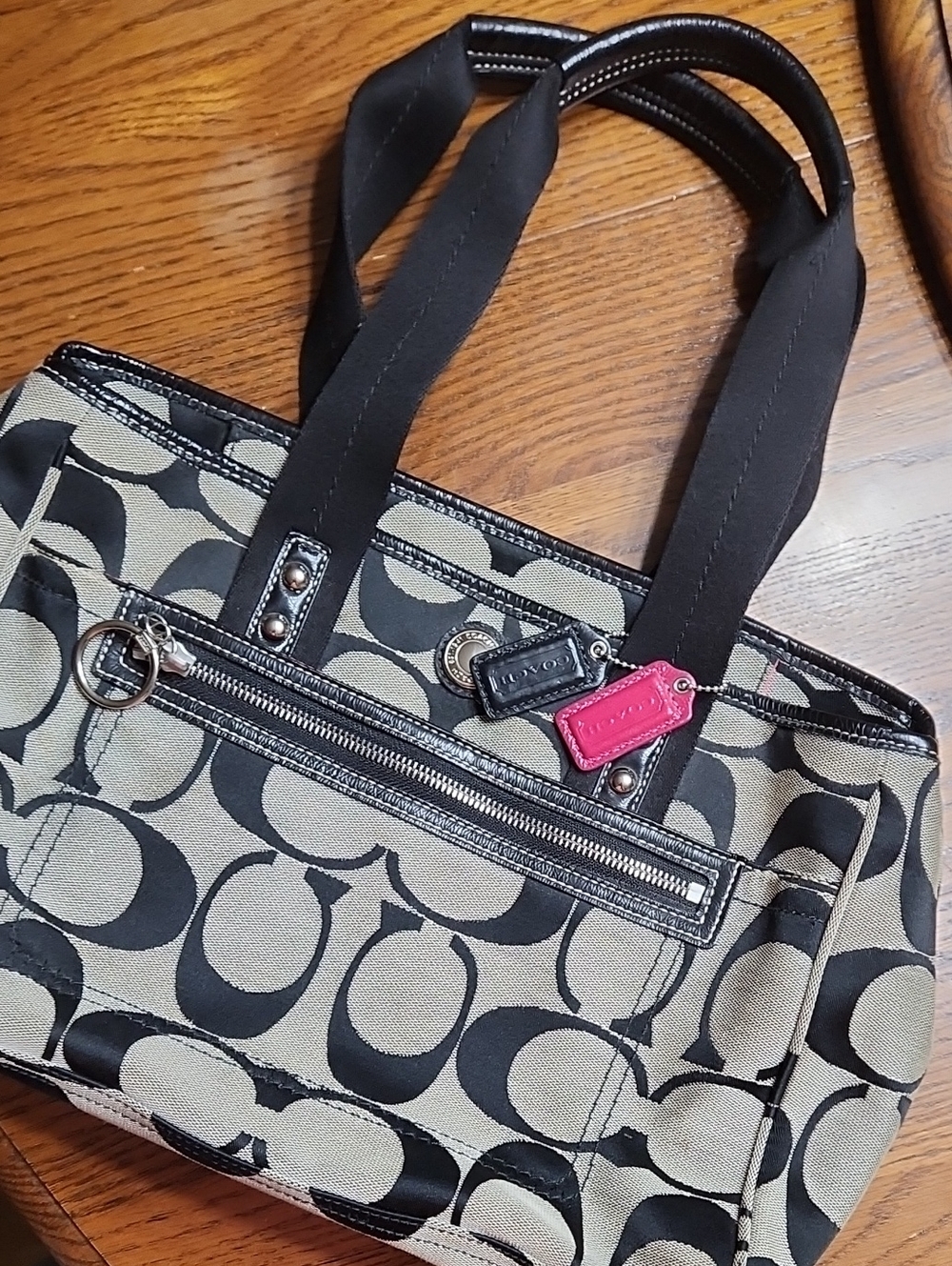 Coach Black Signature "Daisy" Handbag With Black and Pink Tags